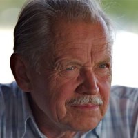 Frank Abbott Older man with white hair and mustache
